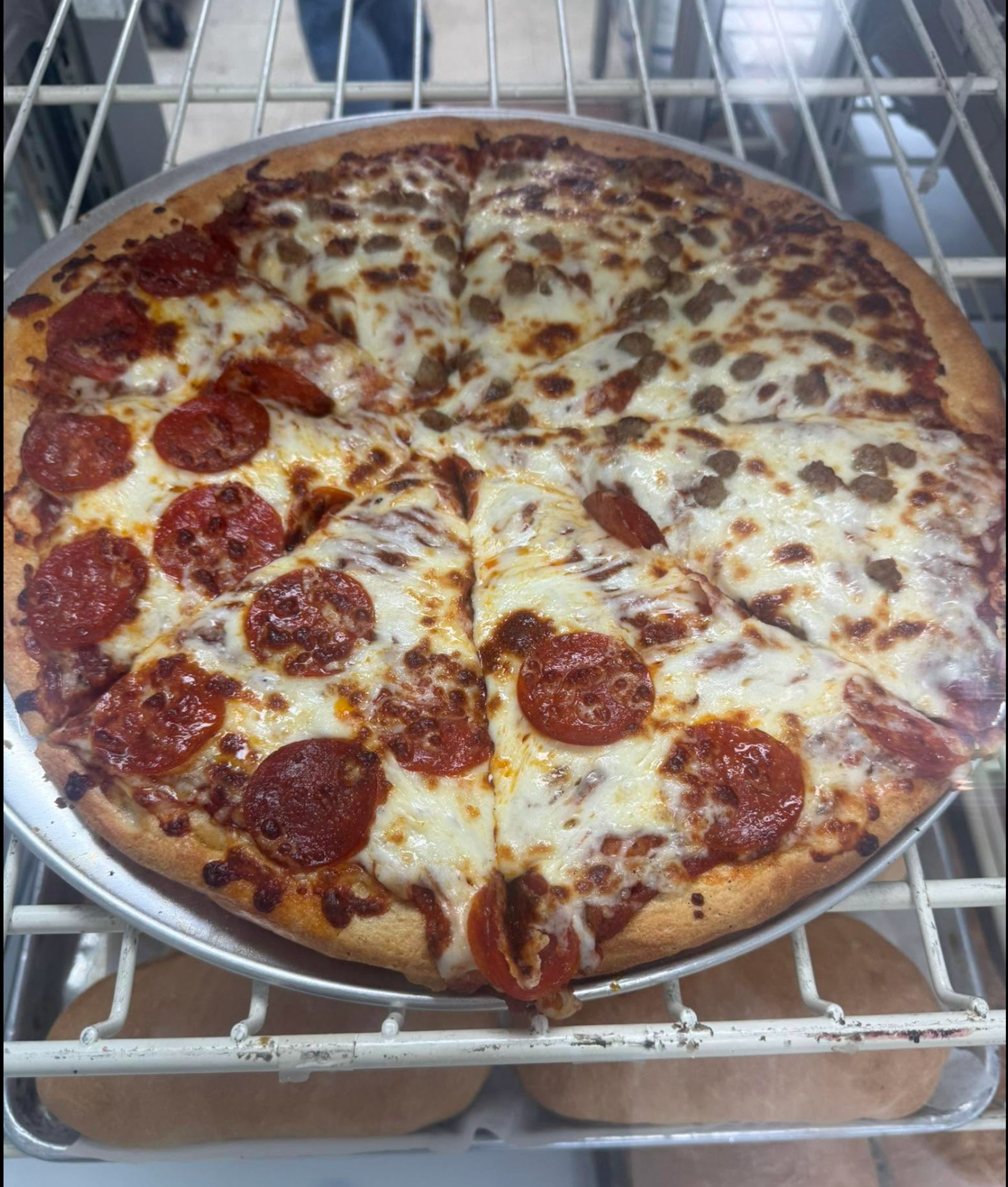 Hand-tossed pizza on homemade dough