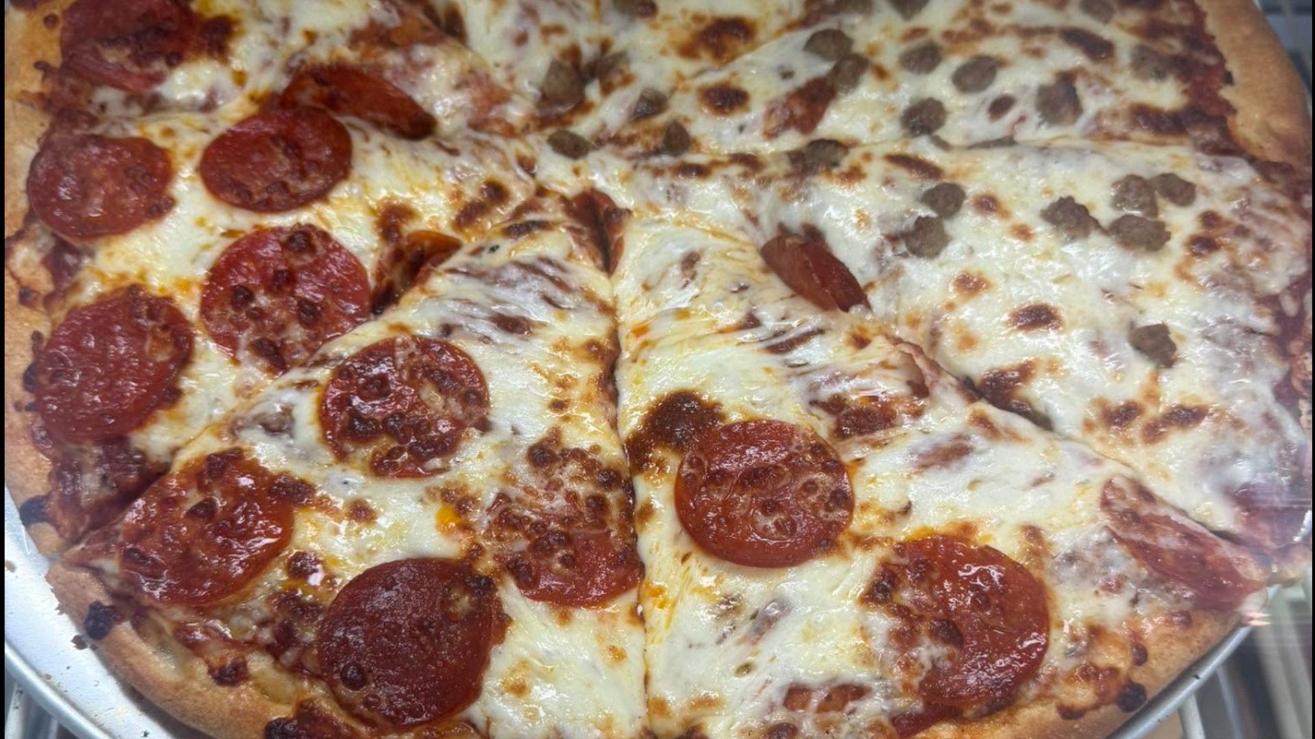 Hand-tossed pizza on homemade dough